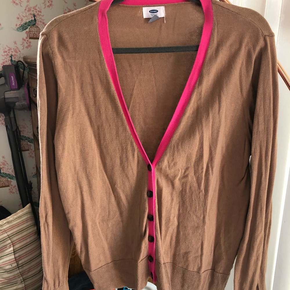 Tan cardigan w pink trim. Excellent condition